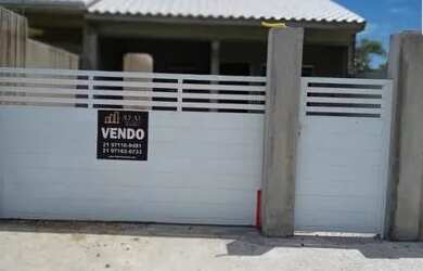 Imagem: A casa possui 2 Dormitórios, 1 Banheiro, 2 Vagas na garagem