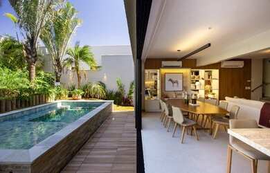 Imagem: A casa em condomínio possui 4 Dormitórios, 4 Banheiros, 2