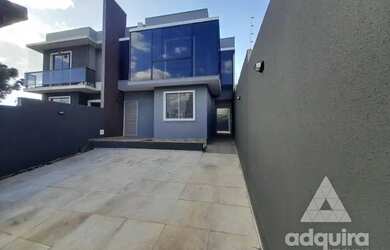 Imagem: A casa possui 3 Dormitórios, 2 Banheiros, 2 Vagas na garagem