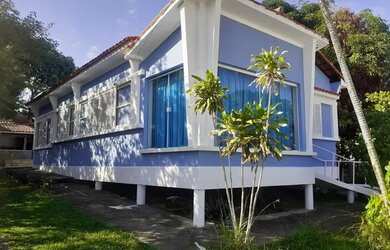 Imagem: A casa possui 3 Dormitórios, 2 Banheiros, 5 Vagas na garagem