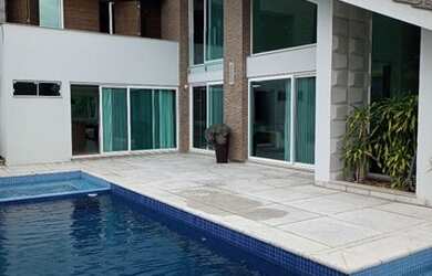 Imagem: A casa possui 4 Dormitórios, 3 Banheiros, 5 Vagas na garagem