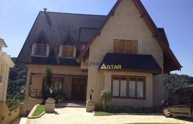 Imagem: A casa em condomínio possui 5 Dormitórios, 5 Banheiros, 5