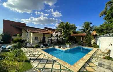 Imagem: A casa possui 4 Dormitórios, 4 Banheiros, 3 Vagas na garagem