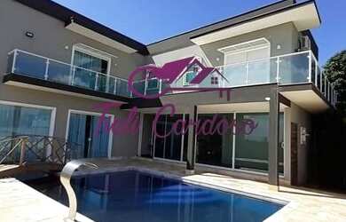 Imagem: A casa em condomínio para alugar possui 4 Dormitórios, 5 Banheiros