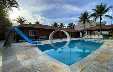 Imagem: A casa em condomínio possui 5 Dormitórios, 3 Banheiros, 5