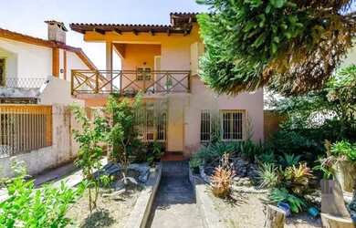 Imagem: A casa possui 5 Dormitórios, 5 Banheiros, 5 Vagas na garagem