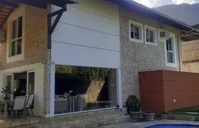 Imagem: A casa em condomínio possui 5 Dormitórios, 5 Banheiros, 3