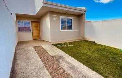 Imagem: A casa possui 2 Dormitórios, 1 Banheiro, 2 Vagas na garagem