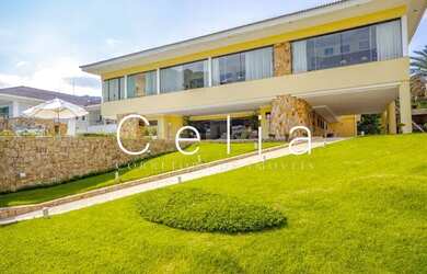 Imagem: A casa possui 5 Dormitórios, 5 Banheiros, 5 Vagas na garagem