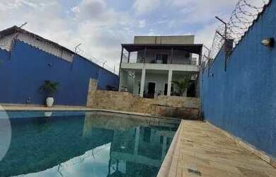 Imagem: A casa possui 3 Dormitórios, 4 Banheiros, 4 Vagas na garagem