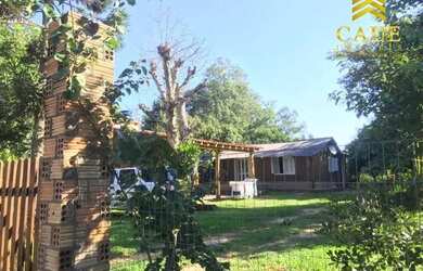 Imagem: A casa em condomínio possui 2 Dormitórios, 2 Banheiros e 600m²