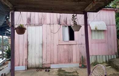 Imagem: A casa possui 2 Dormitórios, 2 Banheiros e está localizado