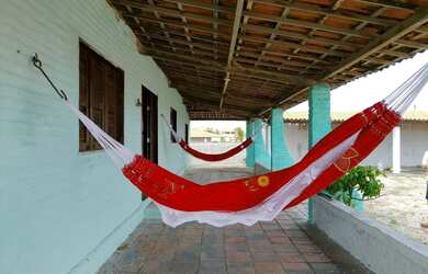 Imagem: A casa possui 5 Dormitórios, 4 Banheiros, 5 Vagas na garagem