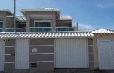 Imagem: A casa possui 4 Dormitórios, 2 Banheiros, 2 Vagas na garagem