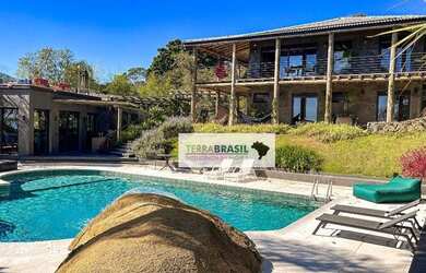 Imagem: A casa em condomínio possui 5 Dormitórios, 5 Banheiros, 4