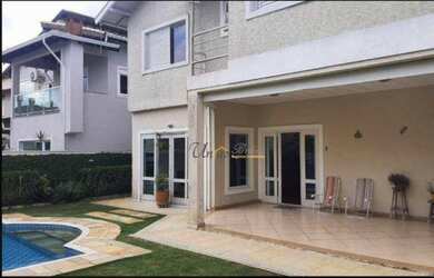 Imagem: A casa em condomínio possui 4 Dormitórios, 5 Banheiros, 4