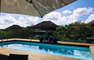 Imagem: A casa possui 3 Dormitórios, 4 Banheiros, 3 Vagas na garagem