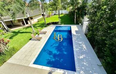 Imagem: A casa em condomínio possui 4 Dormitórios, 5 Banheiros, 4