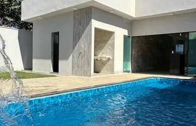 Imagem: A casa possui 3 Dormitórios, 4 Banheiros, 4 Vagas na garagem