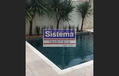 Imagem: A casa em condomínio possui 5 Dormitórios, 5 Banheiros, 2