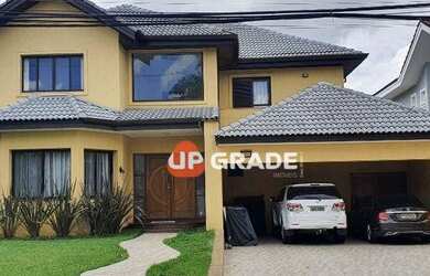 Imagem: A casa em condomínio possui 4 Dormitórios, 5 Banheiros, 4