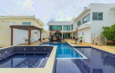 Imagem: A casa possui 5 Dormitórios, 5 Banheiros, 4 Vagas na garagem