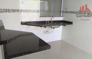 Imagem: A casa possui 3 Dormitórios, 2 Banheiros, 2 Vagas na garagem