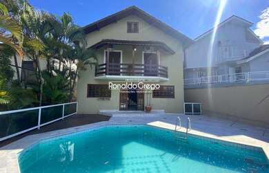 Imagem: A casa possui 3 Dormitórios, 4 Banheiros, 4 Vagas na garagem