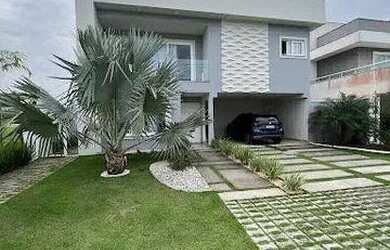 Imagem: A casa em condomínio possui 5 Dormitórios, 5 Banheiros, 4