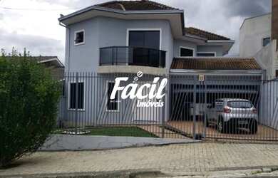 Imagem: A casa possui 3 Dormitórios, 1 Banheiro, 1 Vaga na garagem