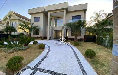 Imagem: A casa em condomínio possui 5 Dormitórios, 5 Banheiros, 5