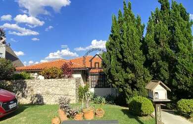 Imagem: A casa possui 3 Dormitórios, 4 Banheiros, 4 Vagas na garagem