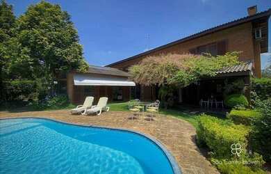 Imagem: A casa em condomínio possui 4 Dormitórios, 5 Banheiros, 5