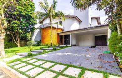 Imagem: A casa em condomínio possui 4 Dormitórios, 5 Banheiros, 4