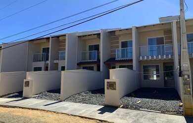 Imagem: A casa possui 2 Dormitórios, 2 Banheiros, 1 Vaga na garagem