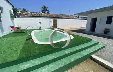 Imagem: A casa possui 5 Dormitórios, 5 Banheiros, 5 Vagas na garagem