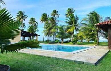 Imagem: A casa possui 5 Dormitórios, 5 Banheiros, 700m² de Área e