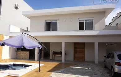 Imagem: A casa possui 5 Dormitórios, 5 Banheiros, 5 Vagas na garagem