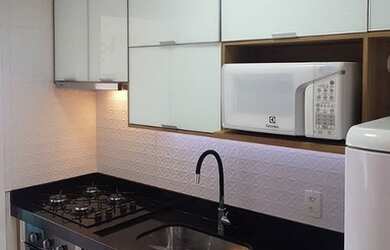 Imagem: O apartamento possui 2 Dormitórios, 1 Banheiro, 1 Vaga na garagem