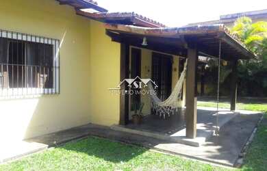 Imagem: A casa possui 3 Dormitórios, 4 Banheiros, 2 Vagas na garagem