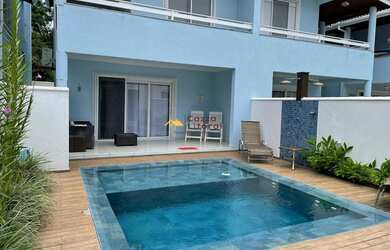 Imagem: A casa em condomínio possui 4 Dormitórios, 4 Banheiros, 2