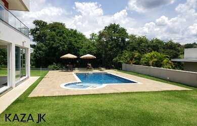 Imagem: A casa em condomínio possui 5 Dormitórios, 5 Banheiros, 5