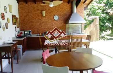 Imagem: A casa em condomínio possui 5 Dormitórios, 5 Banheiros, 4