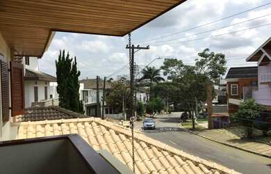 Imagem: A casa em condomínio possui 4 Dormitórios, 4 Banheiros, 2