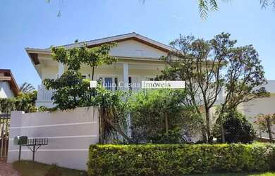 Imagem: A casa em condomínio possui 4 Dormitórios, 4 Banheiros, 5