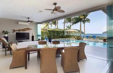 Imagem: A casa em condomínio possui 5 Dormitórios, 5 Banheiros, 600m²