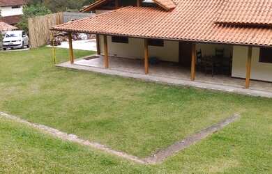 Imagem: A casa possui 2 Dormitórios, 2 Banheiros, 5 Vagas na garagem