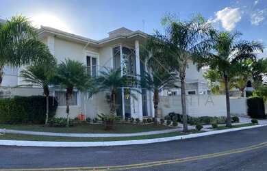 Imagem: A casa em condomínio possui 4 Dormitórios, 5 Banheiros, 4