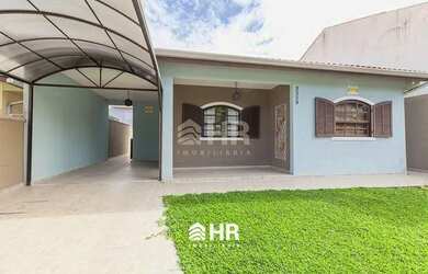 Imagem: A casa possui 3 Dormitórios, 3 Banheiros, 2 Vagas na garagem