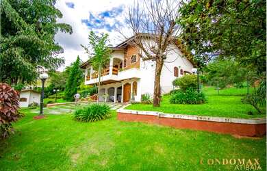 Imagem: A casa em condomínio possui 5 Dormitórios, 5 Banheiros, 5